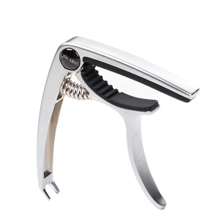 Zinc alloy guitar capo with integrated string-pin puller